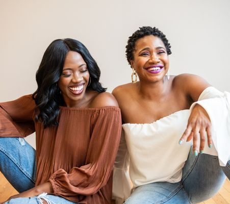 happy black women sitting together image