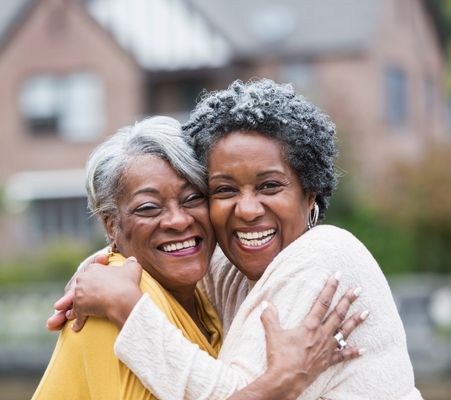 photo of african american women laughing together